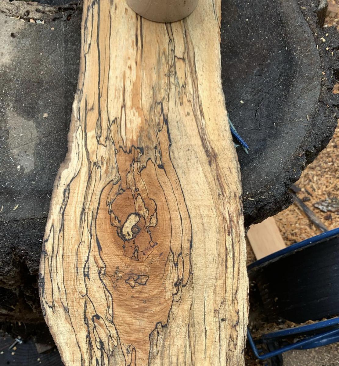 Long figured slab with spalting and a knot