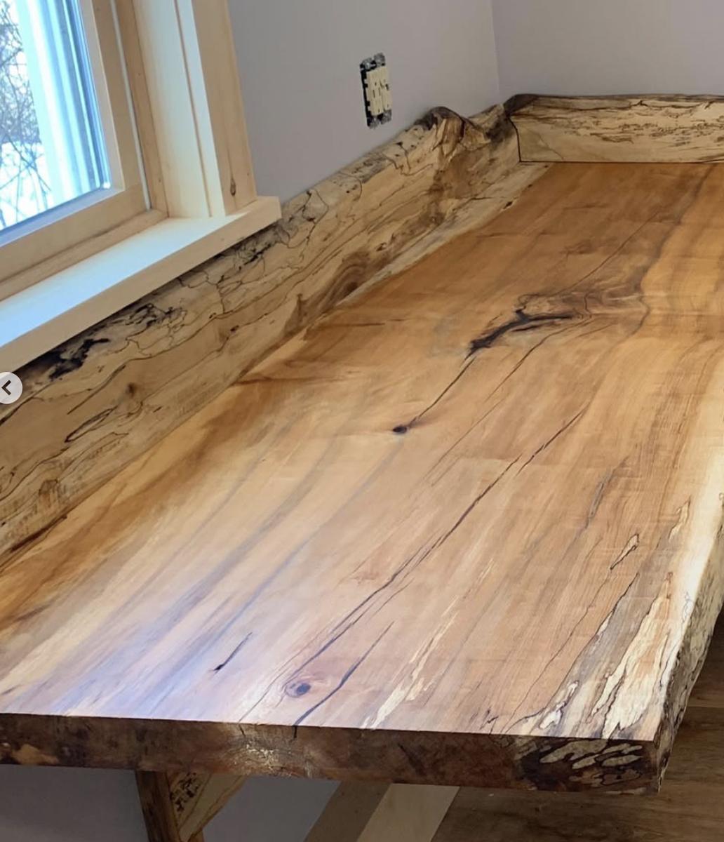Live edge countertop along a window